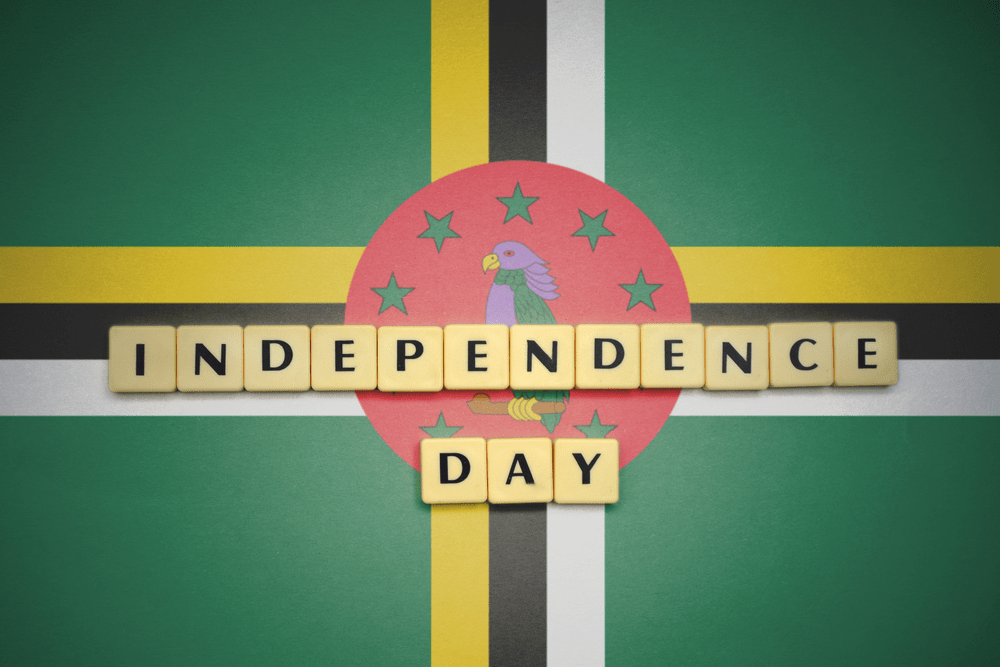 letters with text independence day on the national flag of dominica