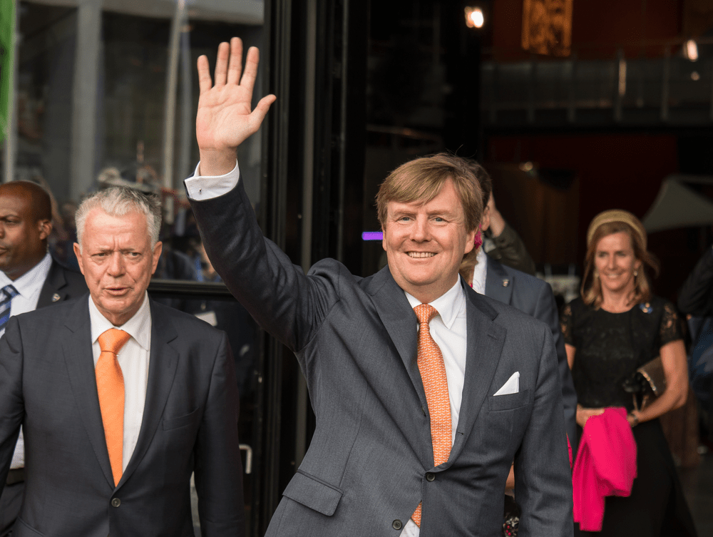 King Willem-Alexander of the Netherlands waves to the crowd