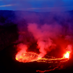 Lava and steam in crater of Nyiragongo volcano in Virunga National Park in Democratic Republic of Congo