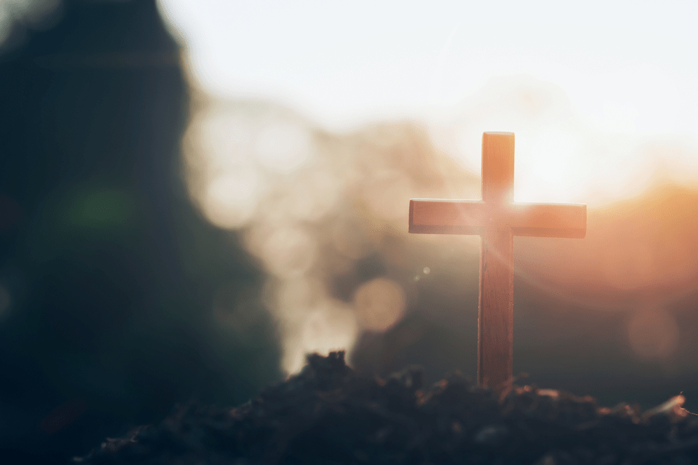 cross on blurry sunset background Christian Christianity