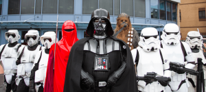 wearing costumes from Star Wars including Darth Vader